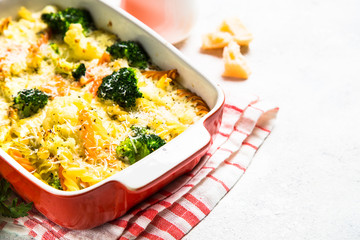 Casserole from pasta and vegetables in baking dish.