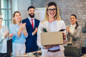 Obraz premium New member of team, newcomer, applauding to female employee, congratulating office worker with promotion, common work practices.