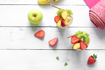 Pink yoga mat and Fruit Salad