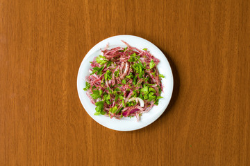 Traditional Turkish onion Kebab Salad in plate on wooden table © Hakan Tanak