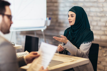 Muslim woman, job applicant having interview