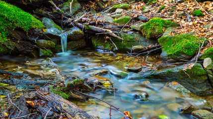 beautiful small rushing mountain river scene