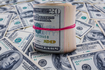 scroll of US dollar on a cash background
