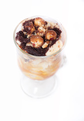 Delicious dessert with banana and caramel around  white