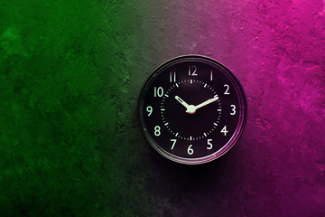 The clock glitch is a duo-tone effect in bright neon, modern colors. Retro wave. Plastic pink, ufo green, proton purple. Horizontal, copy space
