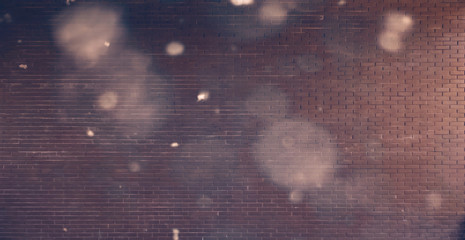 Modern brown brick building wall texture with bokeh lights