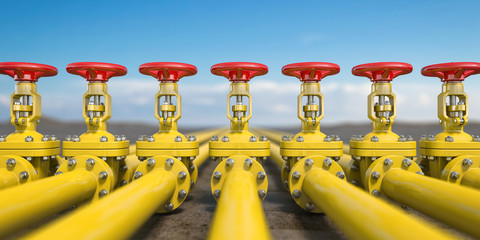 Yellow gas pipe line valves. Oil and gas extraction, production  and transportation industrial background.