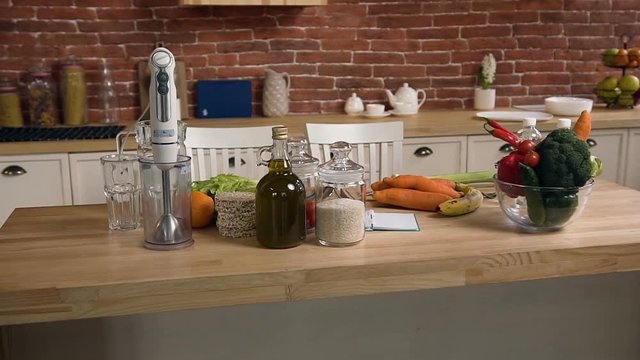 Dolly shot of food on the table in the kitchen.