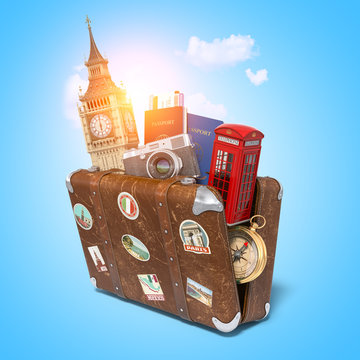 Trip to London, Great Britain.Vintage suiitcase with symbols of UK London, Big Ben tower and red booth. Travel and tourism concept.
