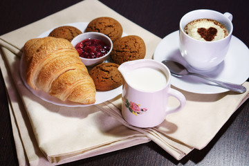 breakfast with coffee and croissant