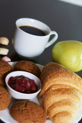 cup of coffee with croissants and coffee