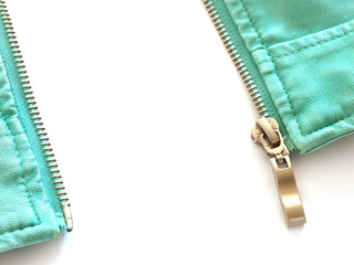 blue leather jacket with a fully opened zipper isolate on a white background. © Olga