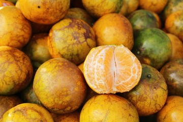 orange fruit is delicious at street food