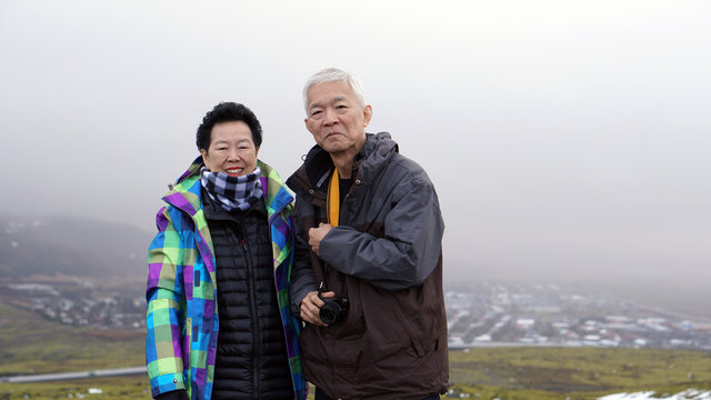 Asian senior coupel anniversary tour trip to Europe Iceland