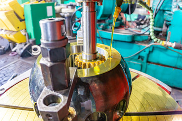 Zuborezka, cutting of the slots on the CV joint of the gear shaft with oil cooling and lubrication.