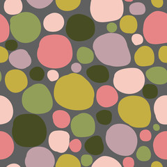 Seamless vector of multicolored geometric shapes on a dark background