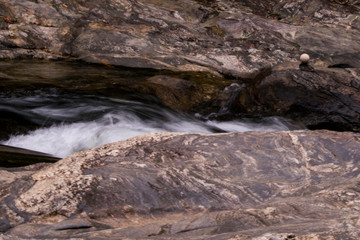 water flowing over rocks