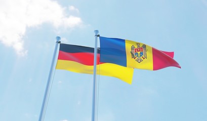Moldova and Germany, two flags waving against blue sky. 3d image