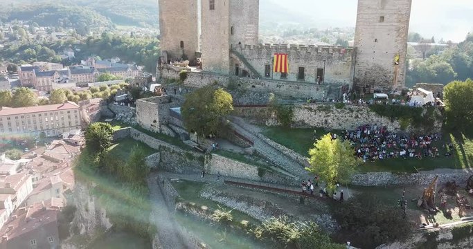 FOIX, FRANCE - October 06, 2018:  Picturesque autumn landscape with imposing medieval fortress Chateau de Foix on hill, France