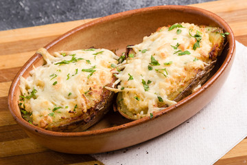 fresh healthy baked delicious baked potato on white plate