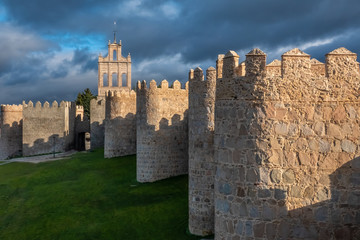 Fototapeta na wymiar The magnificent medieval walls of Avila, Castile-Leon, Spain. A UNESCO World Heritage Site completed between the 11th and 14th centuries