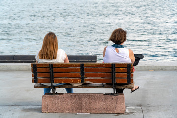 two woman escape busy life