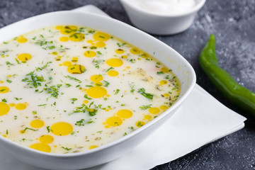 fresh tasty traditional stew soup in white bowl