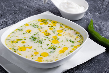 fresh tasty traditional stew soup in white bowl