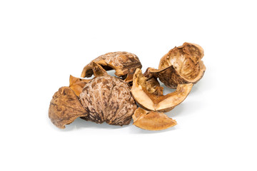 Few cracked Walnut shells isolated on white background