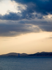 Naklejka na ściany i meble Cloudy sunset in Mallorca beach