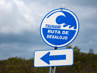 "Ruta de Desalojo" sign in spanish language mean "Evacuation route" in english language. Tsunami Evacuation Route Sign. Puerto Rico, USA.