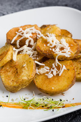 fresh healthy baked delicious baked potato on white plate