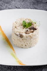 cooked tasty rice portion on white plate