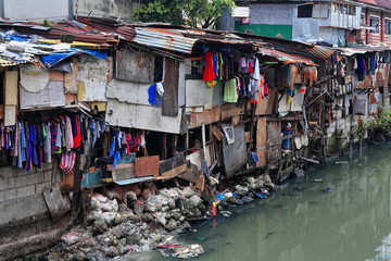 Fototapeta na wymiar Shack crowded banks-Estero de San Lazaro channel. Binondo Chinatown-Manila-Philippines-1010