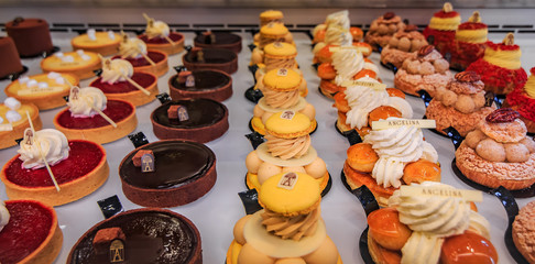 Delicate petit fours desserts at the famous tea house Angelina on Rue de Rivoli in Paris France