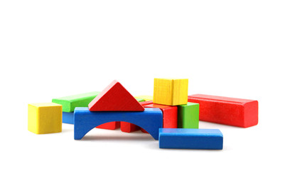 Studio Shot Of Colorful Toy Blocks Against White Background