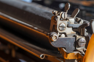 Detail of a historic dusty portable typewriter made in Germany during the twenties of the 20th...