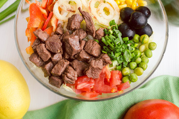 poke bowl with meat, fresh salad