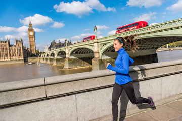 London run fit runner woman jogging. Urban city lifestyle sport girl running near Big Ben. Asian...
