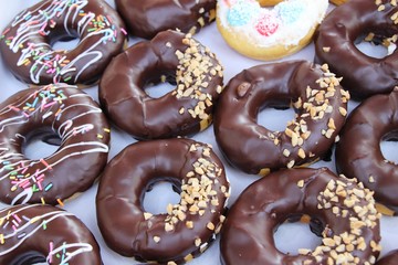 A lot of donut and strawberry jam