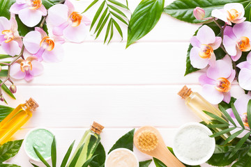 Beauty and fashion concept with spa set on pastel rustic wooden background.