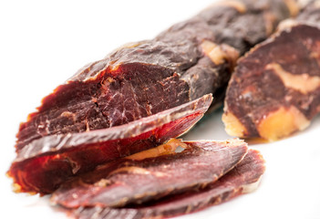 .jerked sausage on a white background