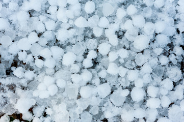 Close up of hail stones on the ground