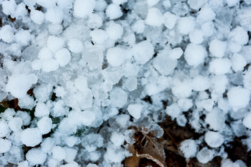 Close up of hail stones on the ground