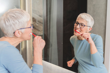Woman brushing her teeth
