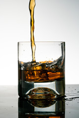whiskey glass and whiskey