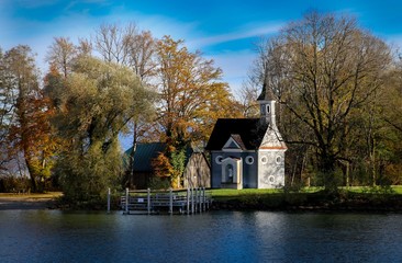 Fototapeta na wymiar tiny chapel on island Fraueninsel in bavarian mountain lake Chiemsee