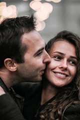 couple in love in the evening city on a romantic date in the city. fashionable people for a walk.