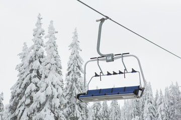 Ski chairlift on mountain in the winter