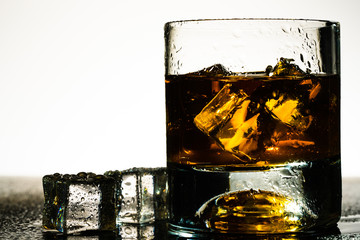 whiskey glass and whiskey